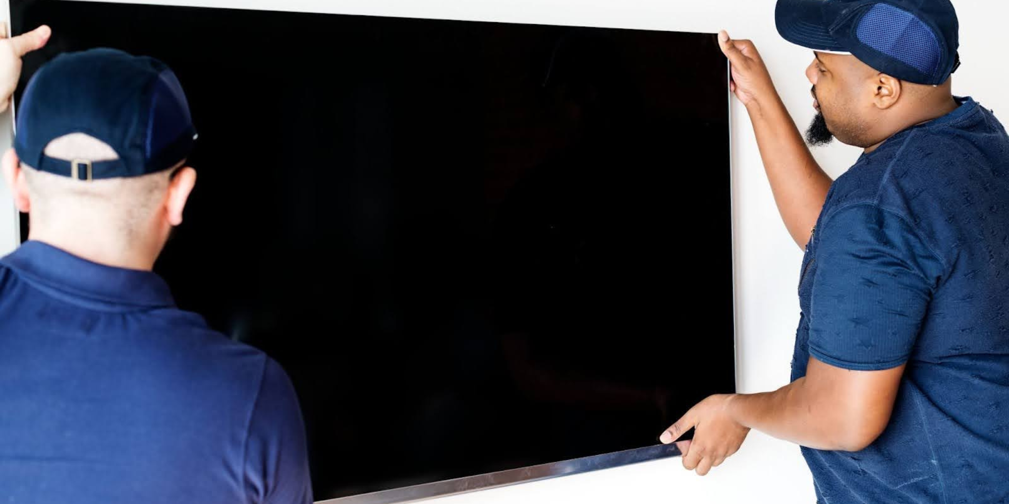 2 men stalling digital signage